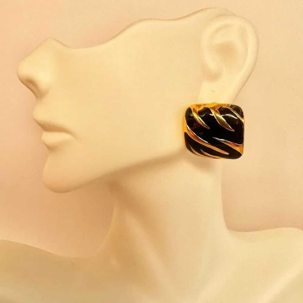 Gold tone and black square post earrings
